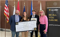 Twins Courtney Skahill and Christopher Skahill holding big check thumbnail245959